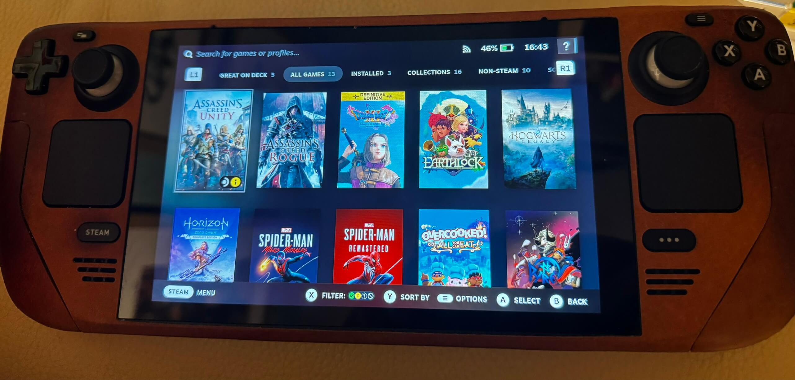 A Steam Deck showing the All Games tab